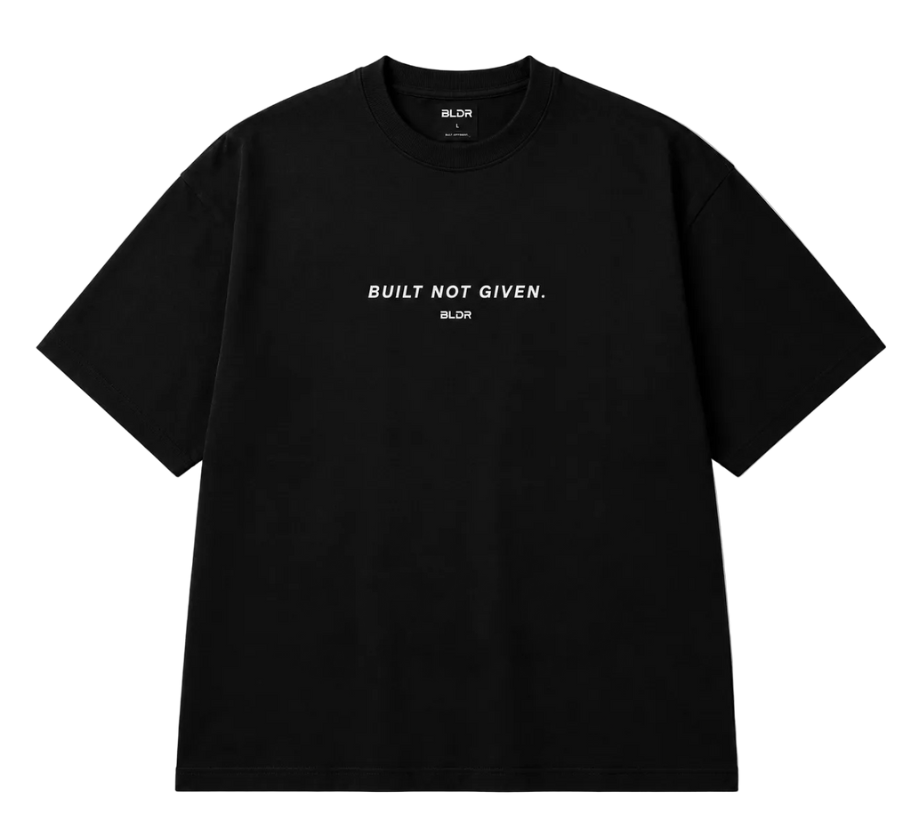 Black t-shirt with 'BUILT NOT GIVEN' text on a white background
