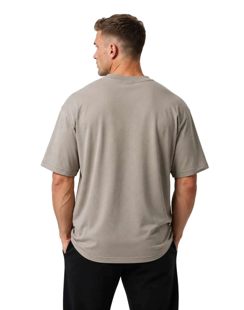 Man wearing a beige t-shirt and black pants on a light gray background