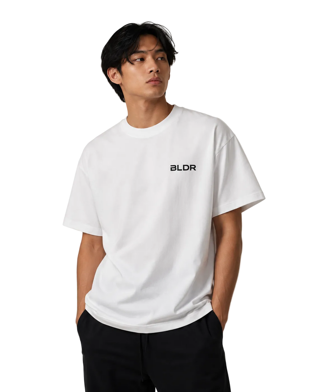 Person wearing a white t-shirt with 'BLDR' logo on a beige background