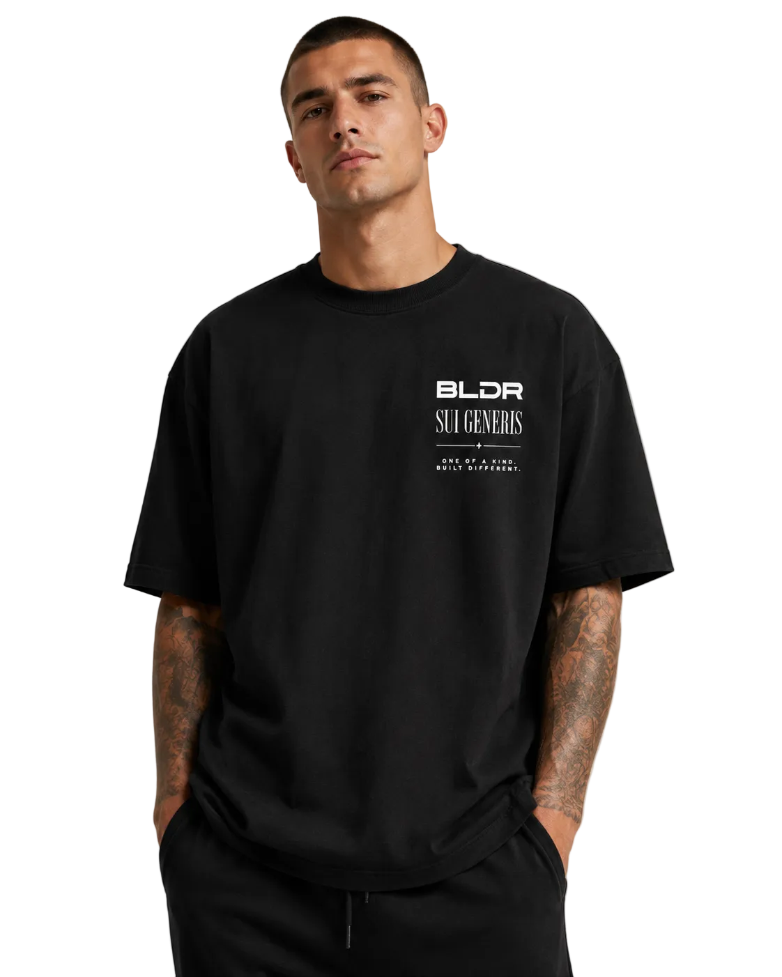 Person wearing a black t-shirt with 'SUI GENERIS' text on the back against a plain background