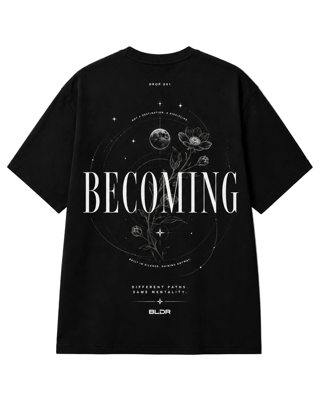 Black t-shirt with 'BECOMING' text and floral design on a white background