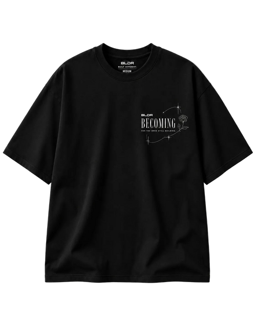 Black t-shirt with white text and design on a light gray background
