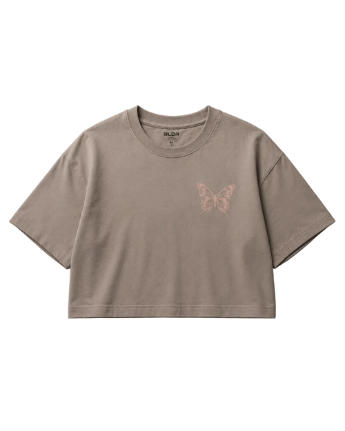 Brown crop top with a butterfly design on a gray background